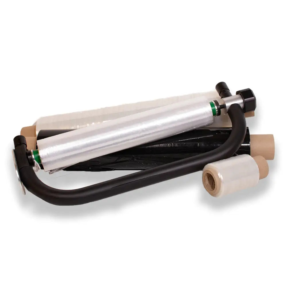 Black and clear pallet wraps in a pile on a white background